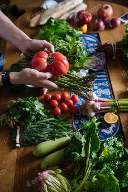 Preview: Woman cooking fresh vegetables