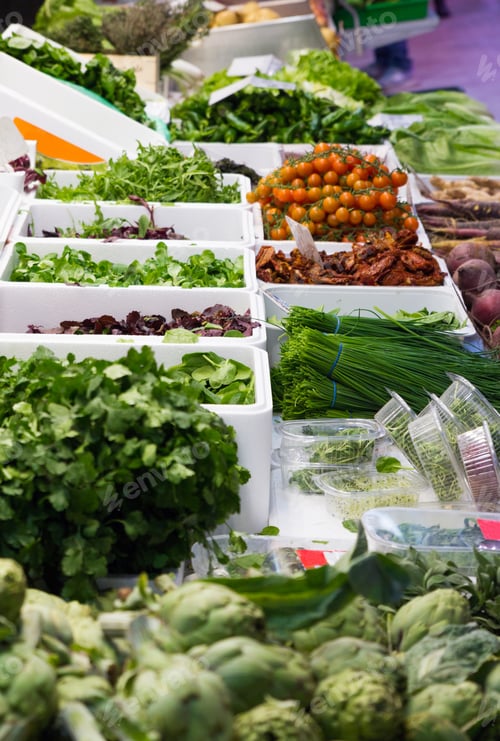 Preview: A market stall full of vegetables