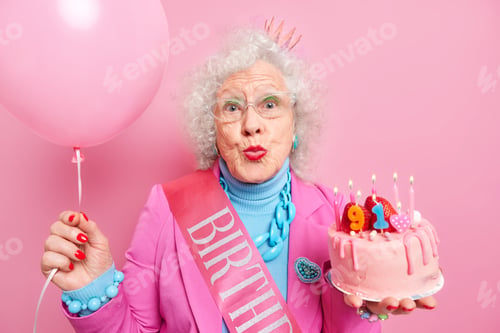 Preview: Lovely curly haired grandmother keeps lips folded wants to kiss someone acceps congratulations on he