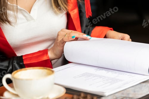 Preview: Close-up photo of young lady with her notebook
