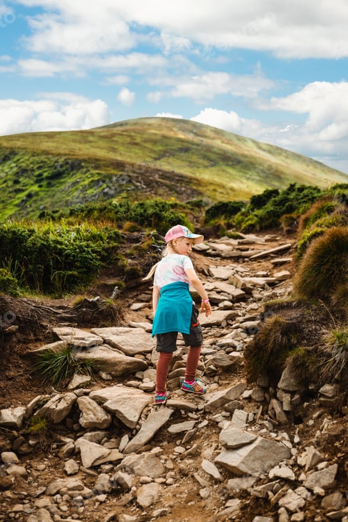 Preview: A girl climbs a mountain