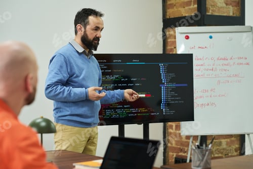 Preview: Middle Aged Caucasian Man Teaching Computer Programming to Incarcerated Adults