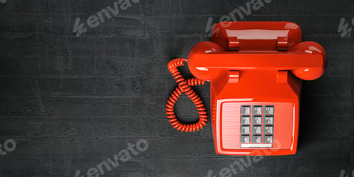 Preview: Red telephone on dirty background. Top view of vintage retro push button telephone