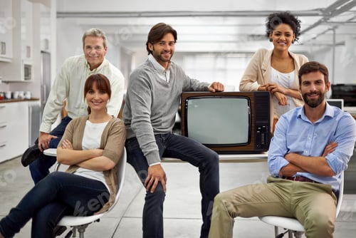 Preview: We are the best in our business. Portrait of a group of dedicated and dynamic design professionals.