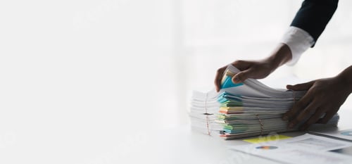 Preview: Cropped short of businesswoman working with stack of document, organizing the project in the office