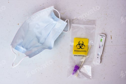 Preview: COVID rapid test and mask on table