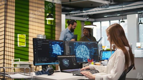 Preview: Junior developer in office streamline workflows using AI systems