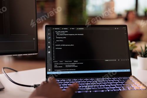 Preview: Male programmer using coding encryption interface