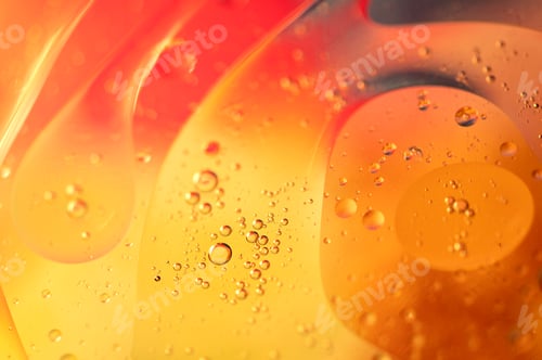 Preview: Oil in water, bright abstract background in yellow,orange and red color tones