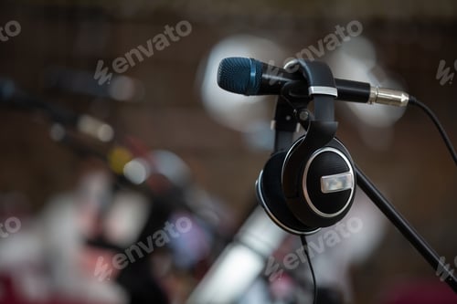 Preview: Closeup shot of a headphone on the microphone on a blurred background