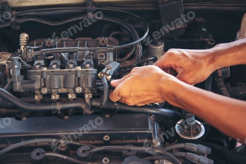 Preview: Close up Car Mechanic man hands repairing car auto repair shop