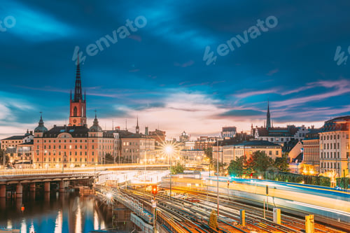 Preview: Stockholm, Sweden. Scenic View Of Stockholm Skyline At Summer Sunset. Riddarholm Church And Subway