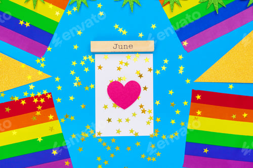 Preview: Gay pride flag on wooden table