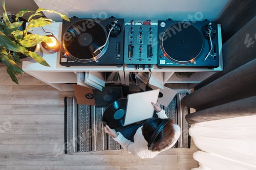 Preview: Music enthusiast in a cozy room enjoying vinyl records