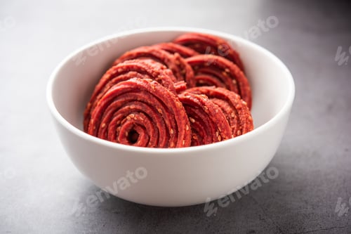Preview: Beatroot chakli, murukku, Beetroot chakli, a spiral fried snack from India made in Diwali festival