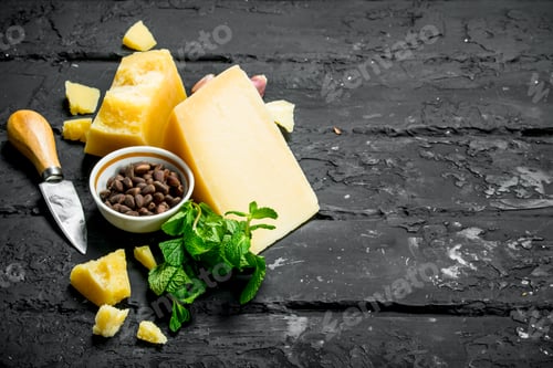 Preview: Parmesan cheese with garlic, pine nuts and mint leaves.