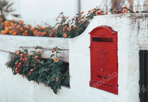 Preview: Beautiful background of a red post and flowers on a entrance