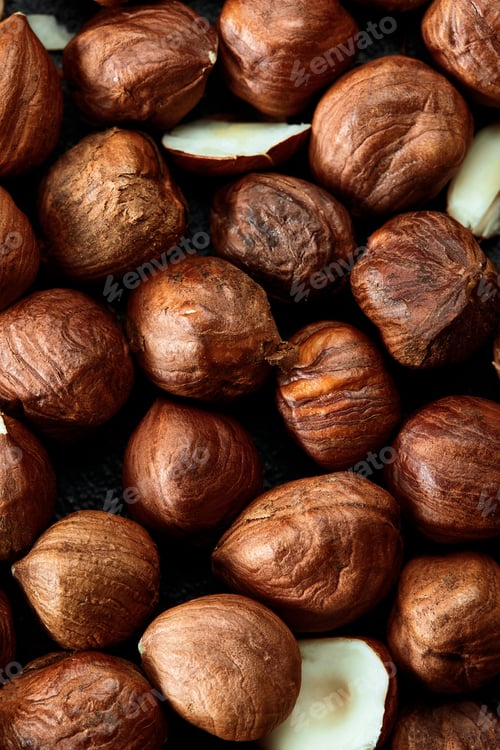 Preview: Close up of Hazelnut kernels - Food Frame Background, macro detailed close up.