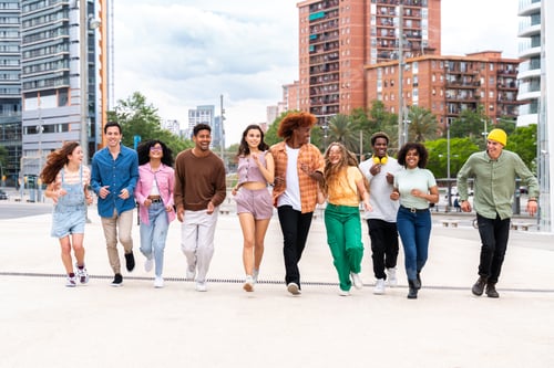 Preview: Joyful Young People Walking Together in the City