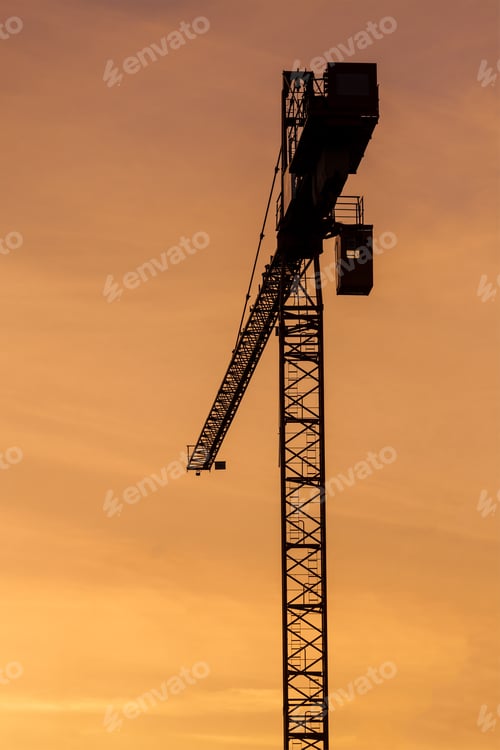 Preview: Building crane silhouettes in sky