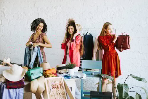 Preview: Three Women Shopping for Clothes and Accessories Indoors