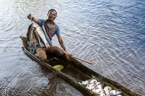 Preview: Fisherman proudly showing off his catch of the day