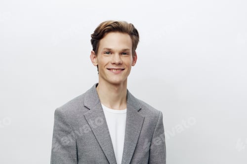 Preview: Confident Young Businessman in Modern Studio - A Portrait of Success and Happiness