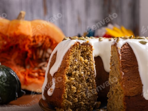 Preview: A delicious pumpkin pound cake on a rustic wooden table, surrounded by pumpkins.