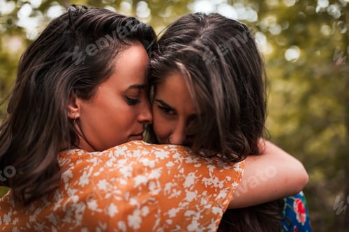 Preview: Two young lesbians caressing each other in the woods