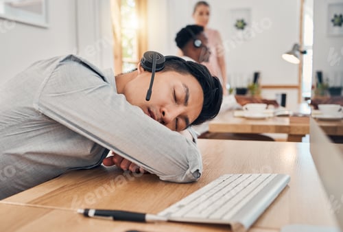 Preview: Tired call center worker sleeping at desk, burnout from working at telemarketing company and stress