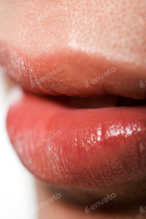 Preview: close up of shiny lips with lip gloss