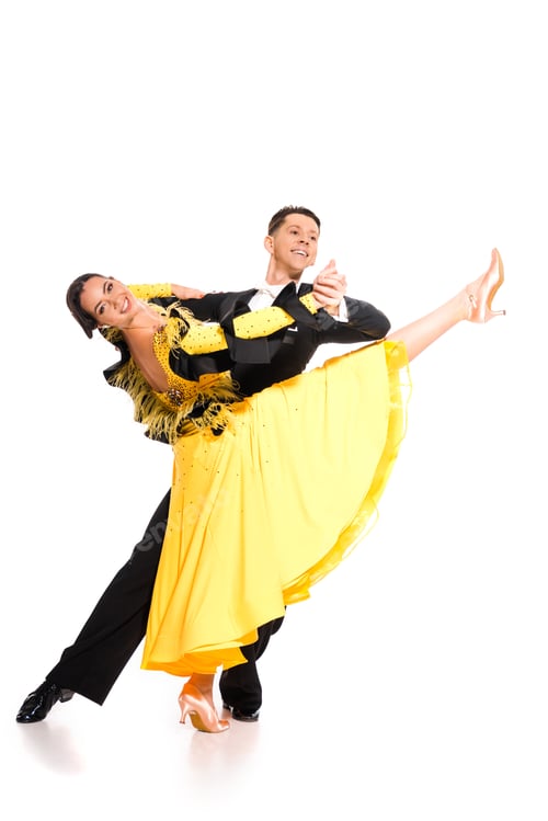 Preview: smiling elegant young couple of ballroom dancers in yellow dress and black suit dancing on white