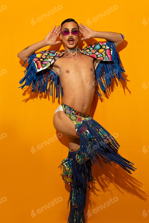 Preview: beautiful drag queen in colorful dress on yellow background