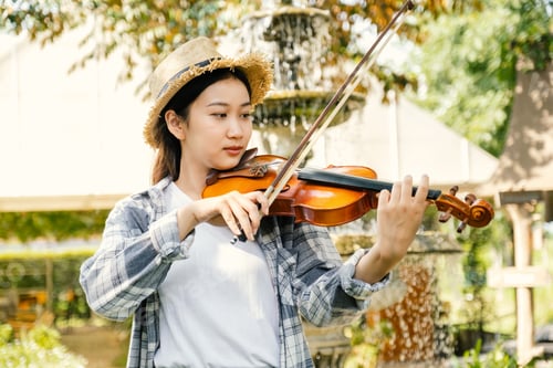 Preview: Close-up portrait of Young Asia woman music violinist play violin