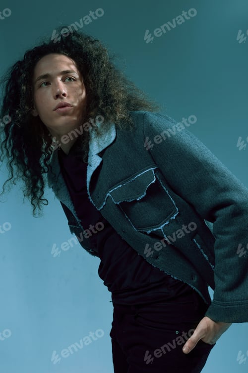 Preview: Portraits Of A Guy With An Attractive Appearance, Curly Hair And Stylish Clothes
