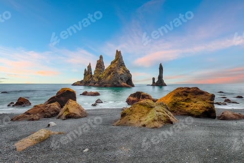 Preview: landscape with basalt rock formations Troll Toes on Black beach Reynisfjara near the village of Vik.