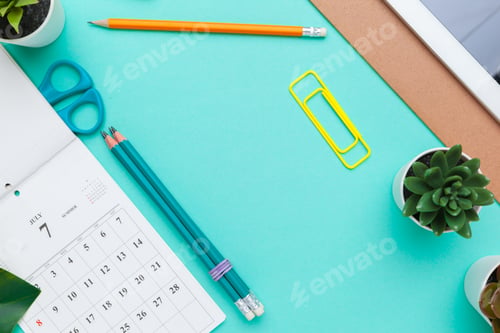 Preview: Top view flat lay of workspace desk styled design office supplies with calendar