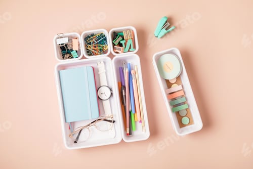 Preview: Desktop organization. Cleaning up messy stationary in plastic organizers