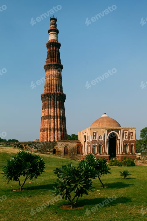 Preview: Vertical low angle shot of Qutub Minar monument in Delhi, India under the beautiful blue sky
