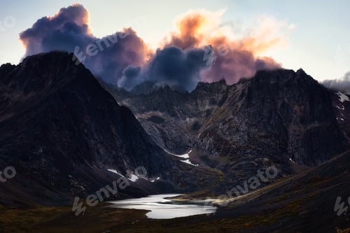 Preview: Aerial View of Dramatic Mountains and Scenic Alpine Lake