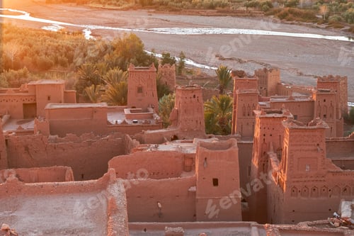 Preview: Ancient city near river in desert and wonderful sky