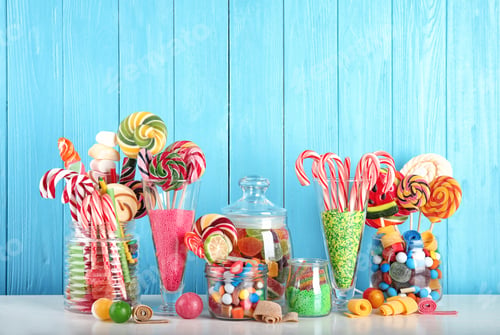 Preview: Composition with many different candies on table