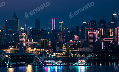 Preview: By the Yangtze River, under the sunset, skyscrapers in Wuhan are illuminated