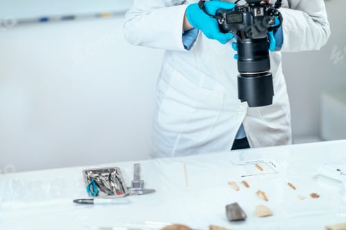 Preview: Archaeology Researchers in Laboratory, Documenting Artifacts with Camera