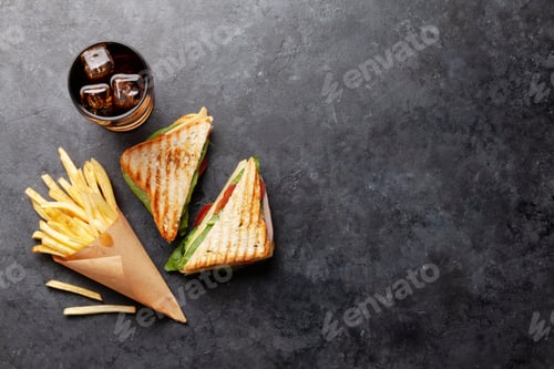 Preview: Club sandwich, potato fries chips and cola