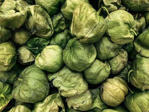 Preview: Tomatillos, common in Mexican cuisine, in a pile at the farmers market.