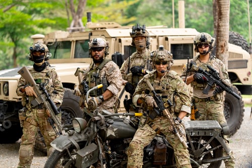 Preview: Group of militaries or soldiers stay in front of humvee car and one sit on motorcycle look at camera