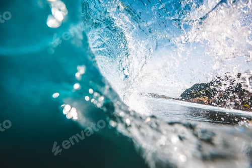 Preview: Magnificent view of a wave with rocks in the background captured in Lombok, Indonesia