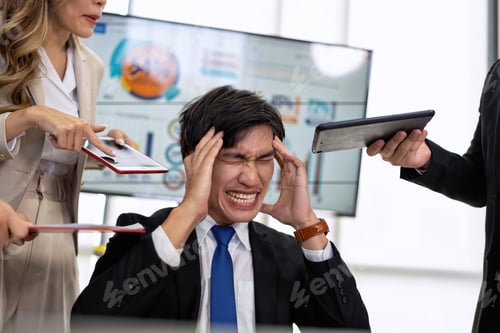 Preview: Stressed overwhelmed business worker feels tired at work overload exhausted suffering from headache