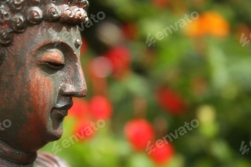 Preview: Buddha Statue in Outdoor Garden With Blurred Background